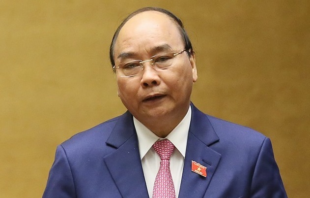 Thủ tướng Nguyễn Xuân Phúc phát biểu trước Quốc hội sáng 21/10. Ảnh: G.H