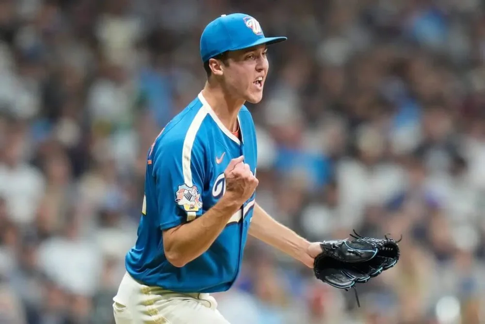 Jacob Misiorowski of the Milwaukee Brewers pumps his right hand in a fist after striking out a batter.